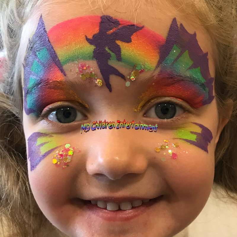 Fairy butterfly face painted girl! Hire us for colourful face painting services in Toronto and gta!