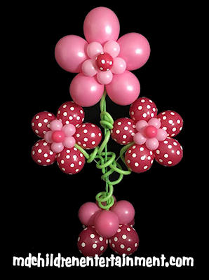 Balloon decoration, column with 3 big flowers. Serving Toronto, Markham, Barrie, Newmarket and surrounding areas.