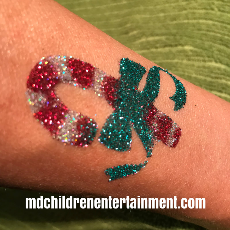Candy cane glitter tattoo for holiday parties in Toronto and the gta!