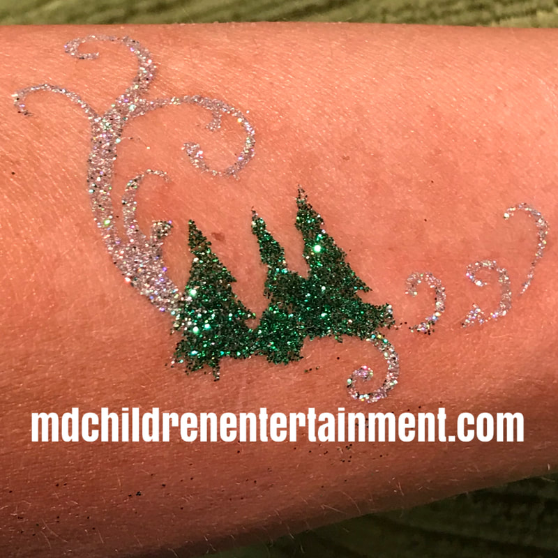 Christmas tree fancy glitter tattoo for holiday events. Serving Toronto, Markham, Newmarket and gta!