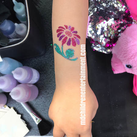 Party entertainment with glitter tattoos!