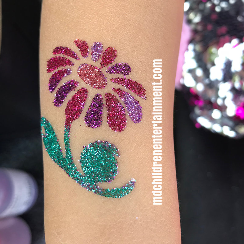 Corporate event children's entertainment with sparkling glitter tattoos!