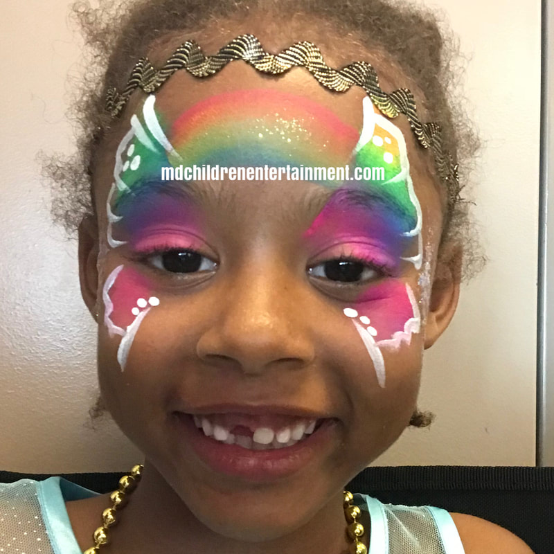 Rainbow face painting by Tanya! Hire me for parties in Toronto, Markham, Richmond Hill and surrounding areas!