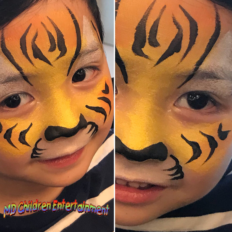 Tiger face painting by Tanya. Toronto, Markham, Richmond Hill, Aurora, Newmarket and more