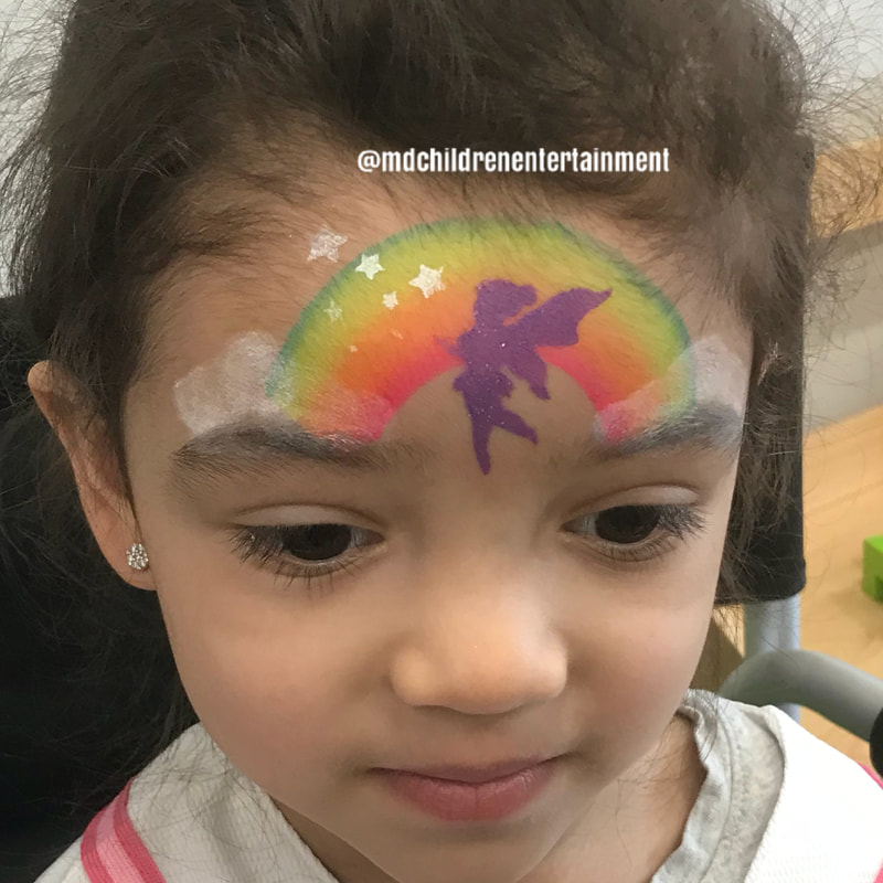 Fairy rainbow face painting, quick and simple. Toronto and greater Toronto areas!