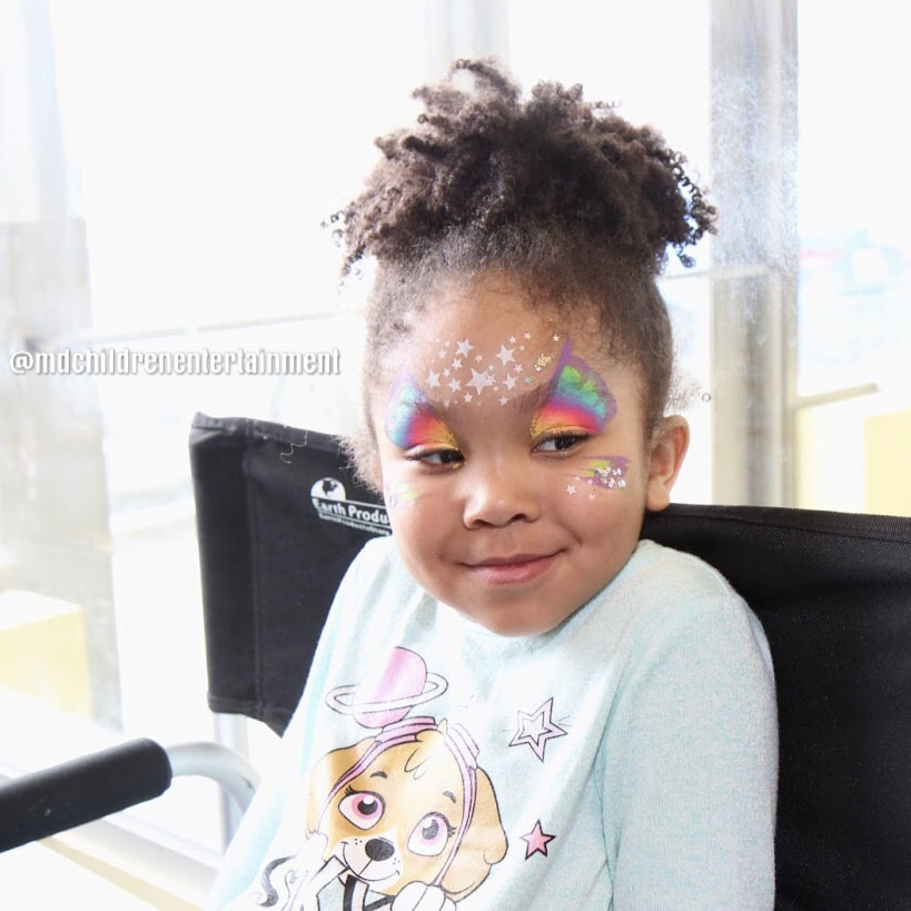 Toronto face painter! Star-A-Fly She is so cute!