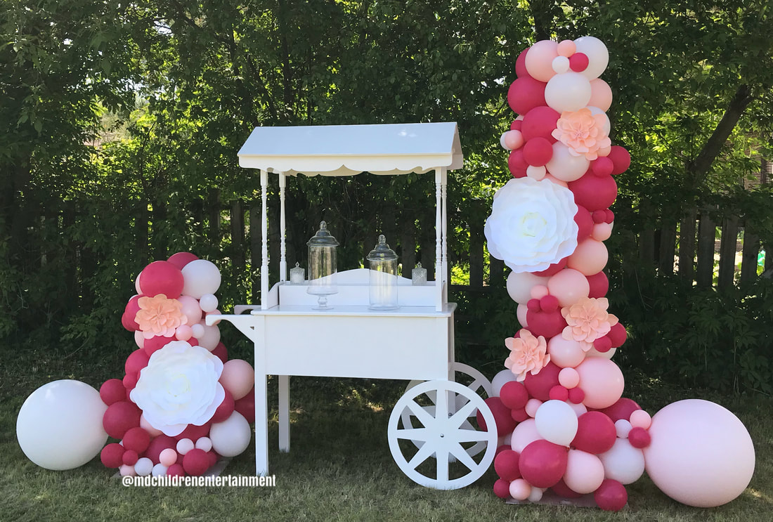 Luxury candy cart rentals with balloon packages!