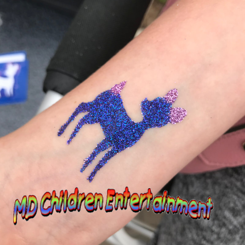 Christmas party entertainers for kids! Glitter tattoos, face painting and balloons! Toronto, Ontario!