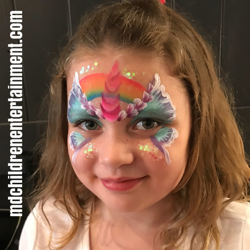 Butterfly unicorn and rainbow face painting!